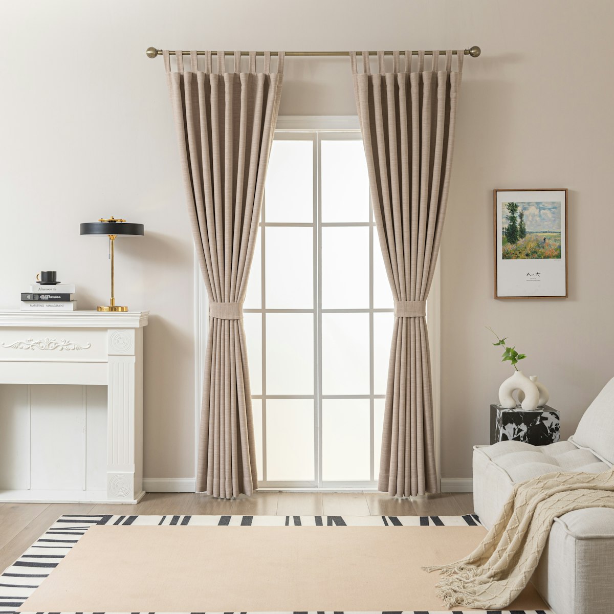 Beige curtains hanging at a bright living room window