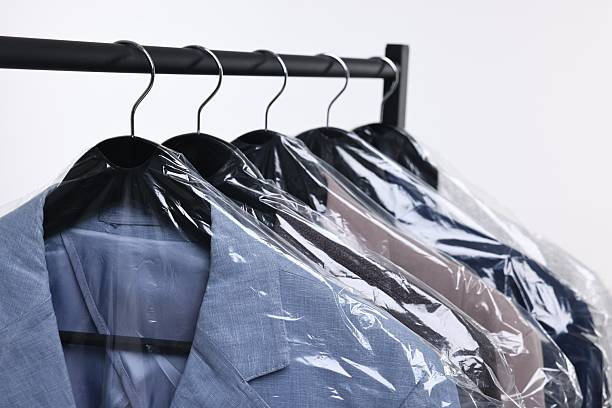 Freshly cleaned garments wrapped and ready for pickup at Baldwin Cleaners